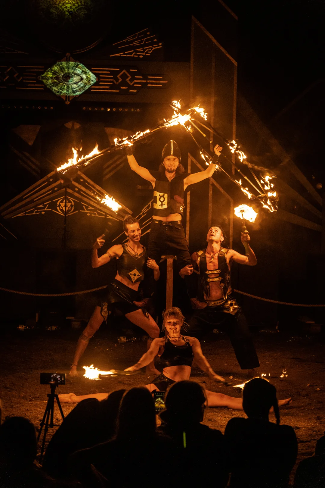 The four Kalayo artists performing together with fire